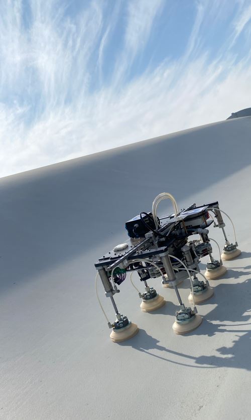 Blade Robot vacuum adhesion legs gripping a blade surface